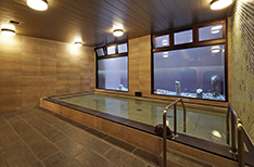 A large communal bath to soothe your work or travel weariness